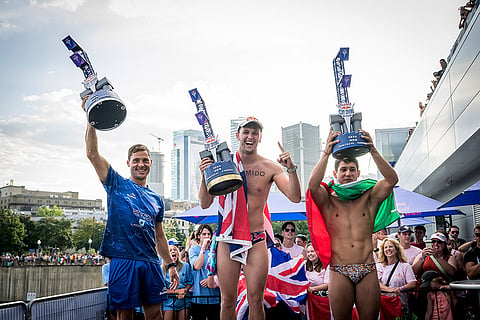 Red Bull Cliff Diving World Series: Constantin Popovici of Romania celebrates with Aidan Heslop of the UK and Yolotl Martinez of Mexico during the final competition